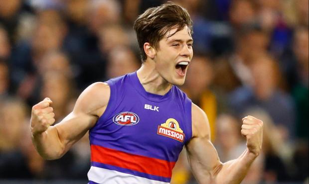 AFL 2016 Second Semi Final - Hawthorn v Western Bulldogs MELBOURNE, AUSTRALIA - SEPTEMBER 16: Josh Dunkley of the Bulldogs celebrates a goal during the 2016 AFL Second Semi Final match between the Hawthorn Hawks and the Western Bulldogs at the Melbourne Cricket Ground on September 16, 2016 in Melbourne, Australia. (Photo by Adam Trafford/AFL Media)